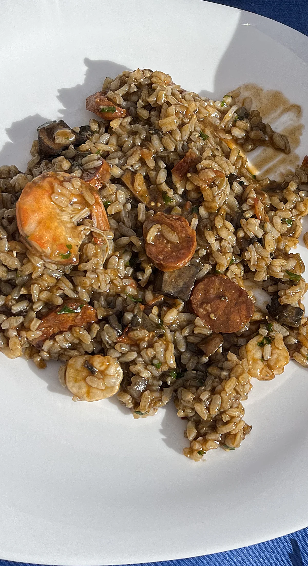 Risotto de gambas y calamares en su tinta